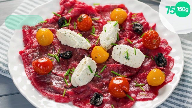 Carpaccio de bœuf, tomates confites, olives noires au Tartare ail et fines herbes
