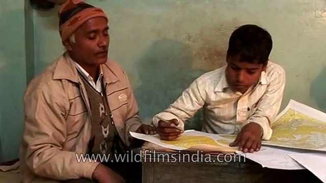 Artisans crafting beautiful designs for Banarasi Sarees