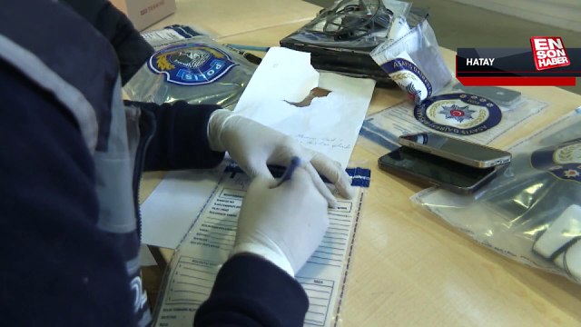 Hatay'da enkazlarda bulunan telefon, tablet ve bilgisayarlar polis gözetiminde korunuyor