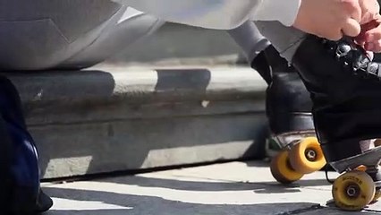 Man in Roller Blades Performing Infront of the People