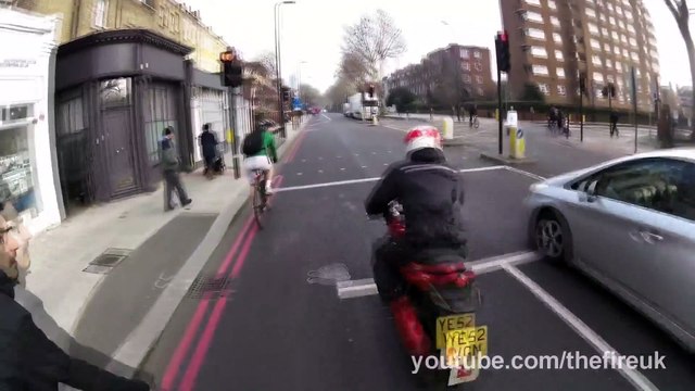 Drives in to cyclist, gets upset when mirror gets folded in...
