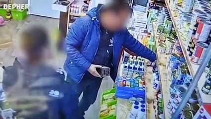 Two thieves stealing from charity shop