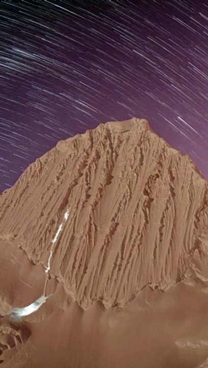 Time-Lapse Shows Mountaineers Climbing Under Starry Sky
