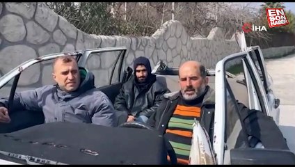 Hatay'da enkaz altından çıkan aracıyla geziyor