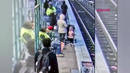 Üç yaşındaki çocuğu tren raylarına attı! O skandal görüntüler...
