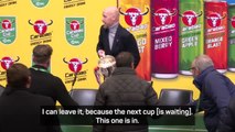 Ten Hag forgets Carabao Cup trophy on news conference exit