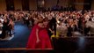 Jessica Chastain trips over her dress while walking onstage at SAG Awards