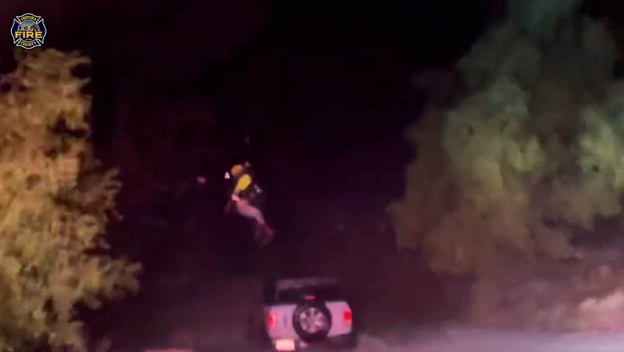 Driver airlifted from roof of car as vehicle submerged in California floodwaters