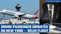 Drunk passenger allegedly urinates on fellow passenger on New York to Delhi flight | Oneindia News