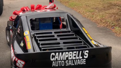 9 y/o boy has JAW-DROPPING reaction to being surprised with his first race car