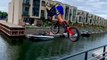 Guy Jumps Into Water With His Bike After Performing Balancing Tricks on it