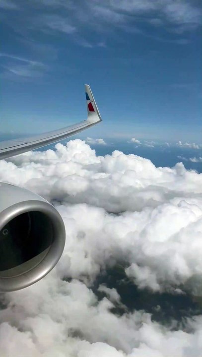 Cloudy Sky View From Airplane Window View of Clouds from an Airplane Window