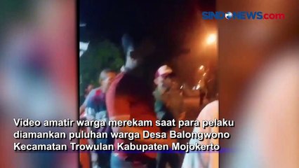 Video herunterladen: Polisi Gadungan di Mojokerto Jawa Timur Dihajar Massa