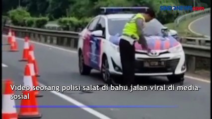Kawal Arus Mudik, Polisi Ini Salat di Pinggir Tol