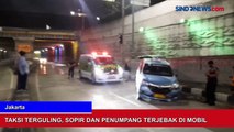 Hindari Penyebrangan Jalan, Taksi Terguling di Kuningan