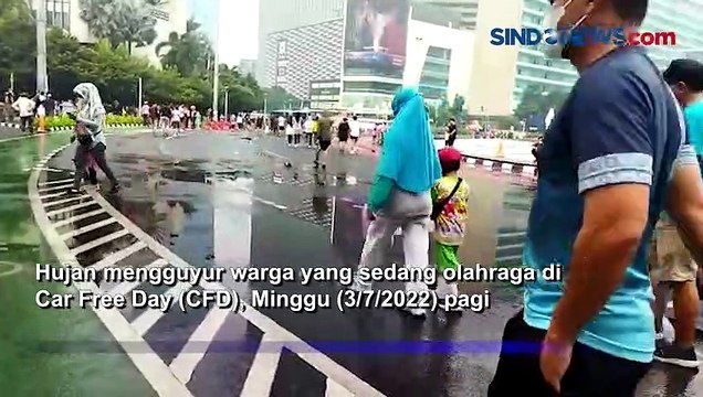 Hujan, Warga Tetap Antusias Olahraga di CFD Sudirman-Thamrin