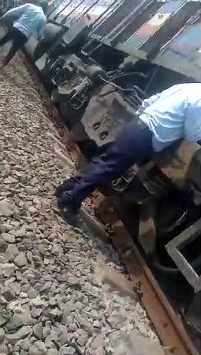 derailed coal loaded goods train engine