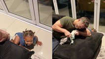 'Our daily life' - Dad shows that putting a baby in pajamas isn't as easy as it may seem