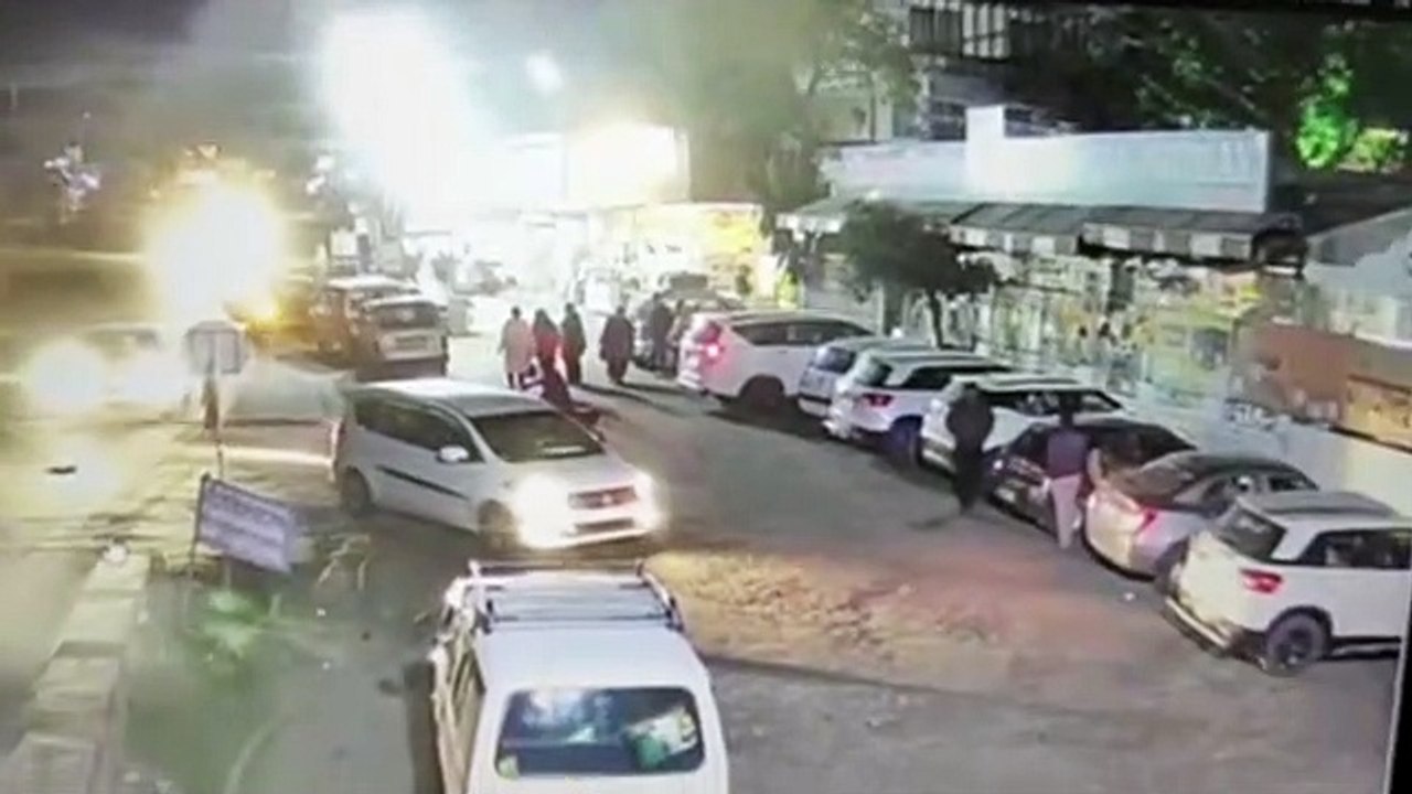 trying to reach the robbers with handcuffs