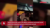 Taksim'de taksiciyle turist arasında ücret tartışması! Ayağıyla kapıyı tutup direndi