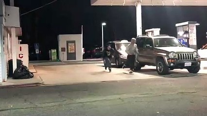 Guy takes another man's skateboard and spears him in the back