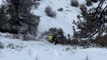 *Winter sledding fail* Sledder coming down a cliff has hard time steering the sled