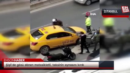 Şişli’de gözü dönen motosikletli, taksinin aynasını kırdı