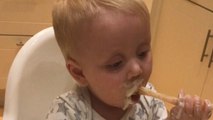 Adorable baby boy has 'choice words' to express his excitement while learning to eat