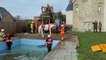 Firefighters use winch to rescue a helpless horse which became stuck in a swimming pool