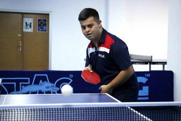 Down sendromlu Umut'un en büyük hedefi masa tenisinde kupa kaldırmak