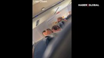 Uçakta büyük panik: Yolcu acil çıkışı açmaya çalıştı