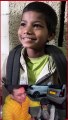 An eight-year-old boy earns thirty thousand rupees a month by selling socks.