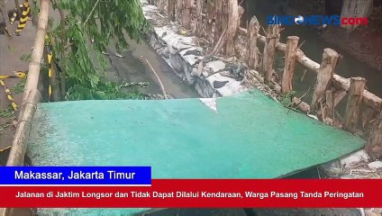Jalanan Longsor dan Tidak Dapat Dilalui Kendaraan, Warga di Jaktim Pasang Tanda Peringatan