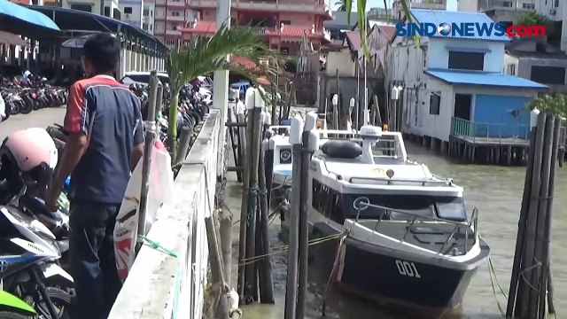 Jembatan Terputus dan Sebuah Kapal Terbalik akibat Cuaca Buruk dan Angin Kencang