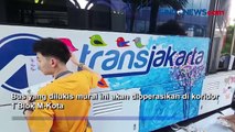 Peringati Hari Disabilitas Internasional, Transjakarta Gandeng Difabel Melukis Mural di Bus