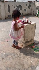 Cute Trishu celebrating holi with father