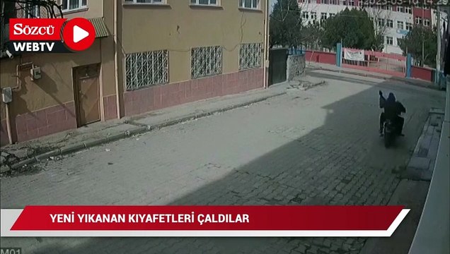 Kuruması için asılan kıyafetleri çalan hırsızlar güvenlik kamerasına yakalandı