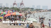 People flock to Baseco Beach in Tondo, Manila