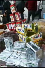 Selling aid provided to those affected by the earthquake in Syria in a Damascus market