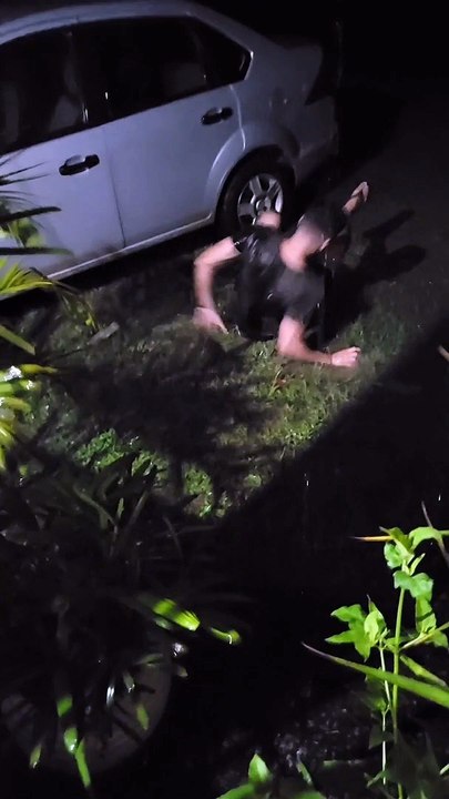 Guy Slips in Puddle While Trying to Get into Car
