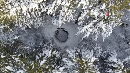 Türkiye'nin ilk milli parkındaki kar kuyuları görenleri geçmişe götürüyor