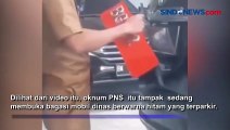 Terekam Kamera, Oknum PNS Ganti Plat Merah Mobil Dinas ke Plat Hitam