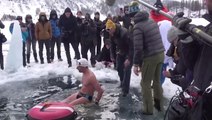 Diver plunges 50 metres down icy lake in Switzerland