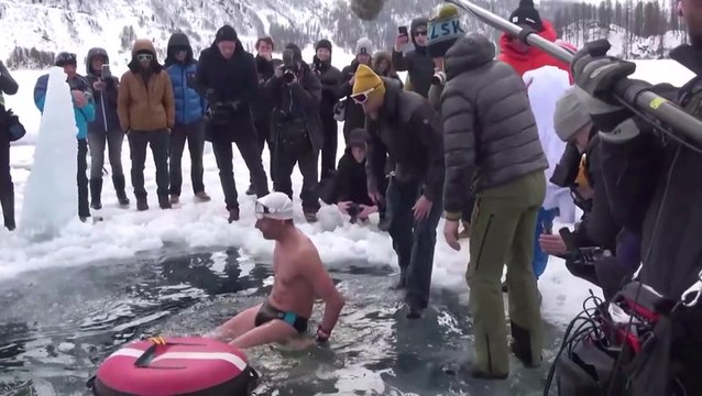 Diver plunges 50 metres down icy lake in Switzerland
