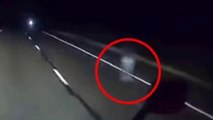 Creepy Dashcam Video from a Trucker Shows a Ghost Like Figure Floating Down the Middle at Night
