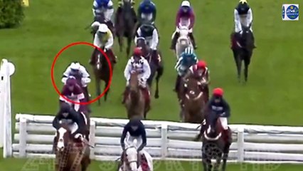 Jockey Ricky Doyle CLINGS ON to horse Foxy Jacks after nearly falling off in the Glenfarclas Cross Country Chase at Cheltenham... before the Irishman is eventually unseated later down the line