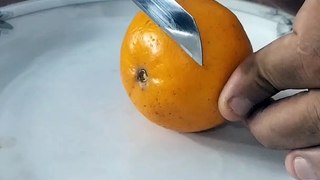 an amazing idea.orange candle ️. how to make diy orange fruit candle.