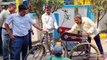 Corporation commissioner gave tricycle to the disabled