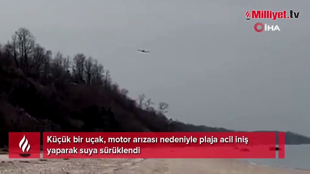 Plaja acil iniş yapan uçak denize sürüklendi