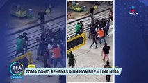 Delincuente toma como rehenes a un hombre y a una niña
